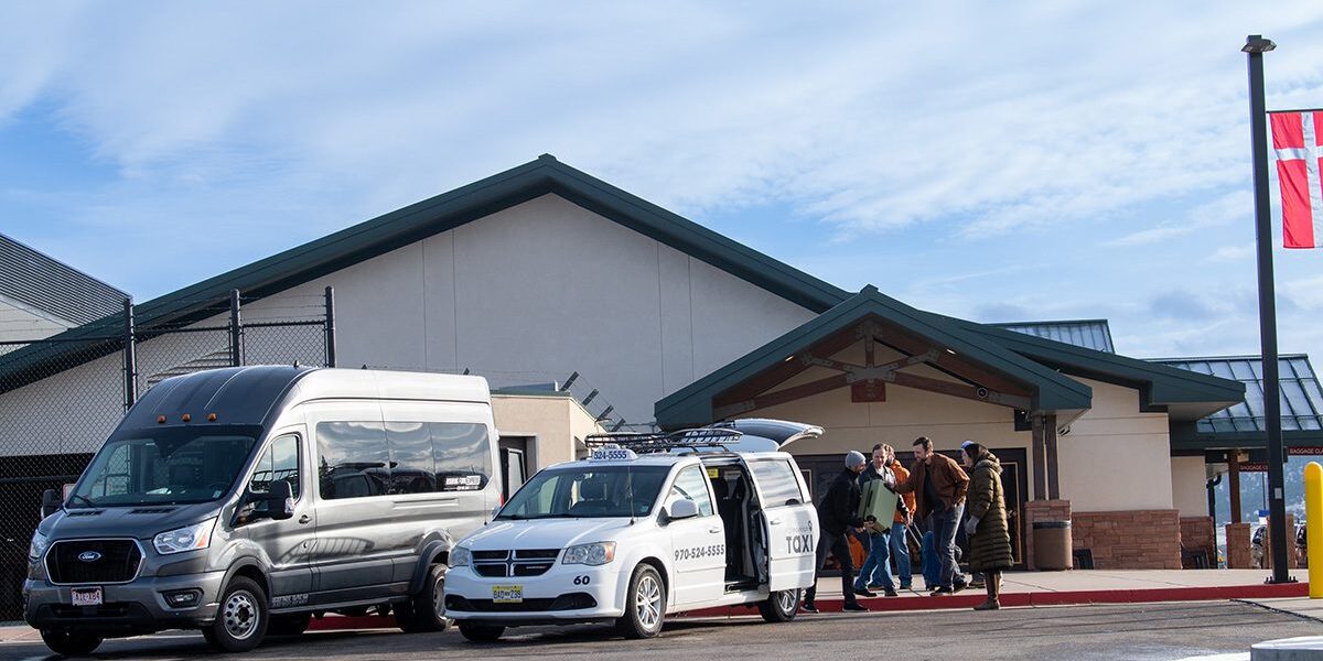 Vans outside building